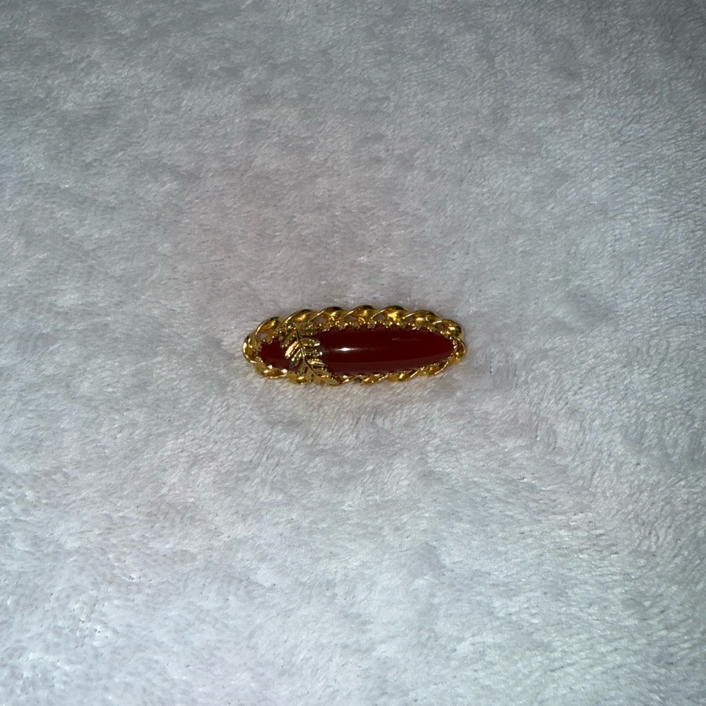 Vintage burgundy oval gold brooch